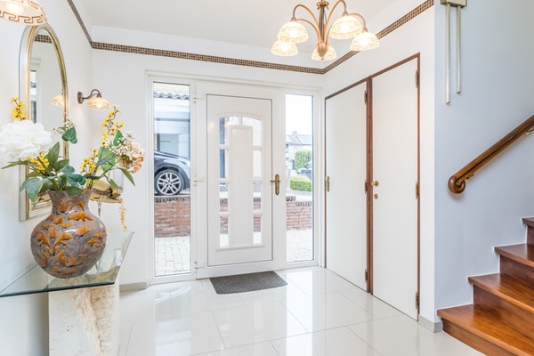 Foto - Te koop: Ruime goed onderhouden geschakelde 2 onder 1 kap woning in Bocholtz